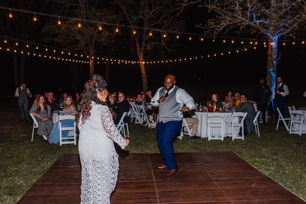 groom sharing a dance with his mother