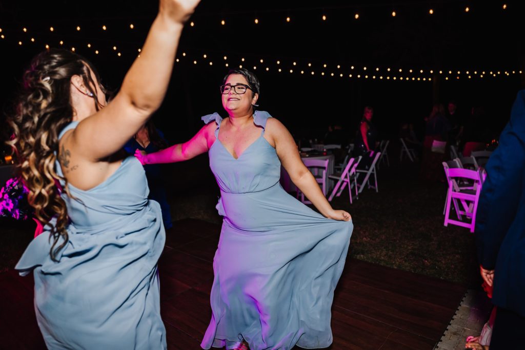 wedding guests dancing at wedding reception