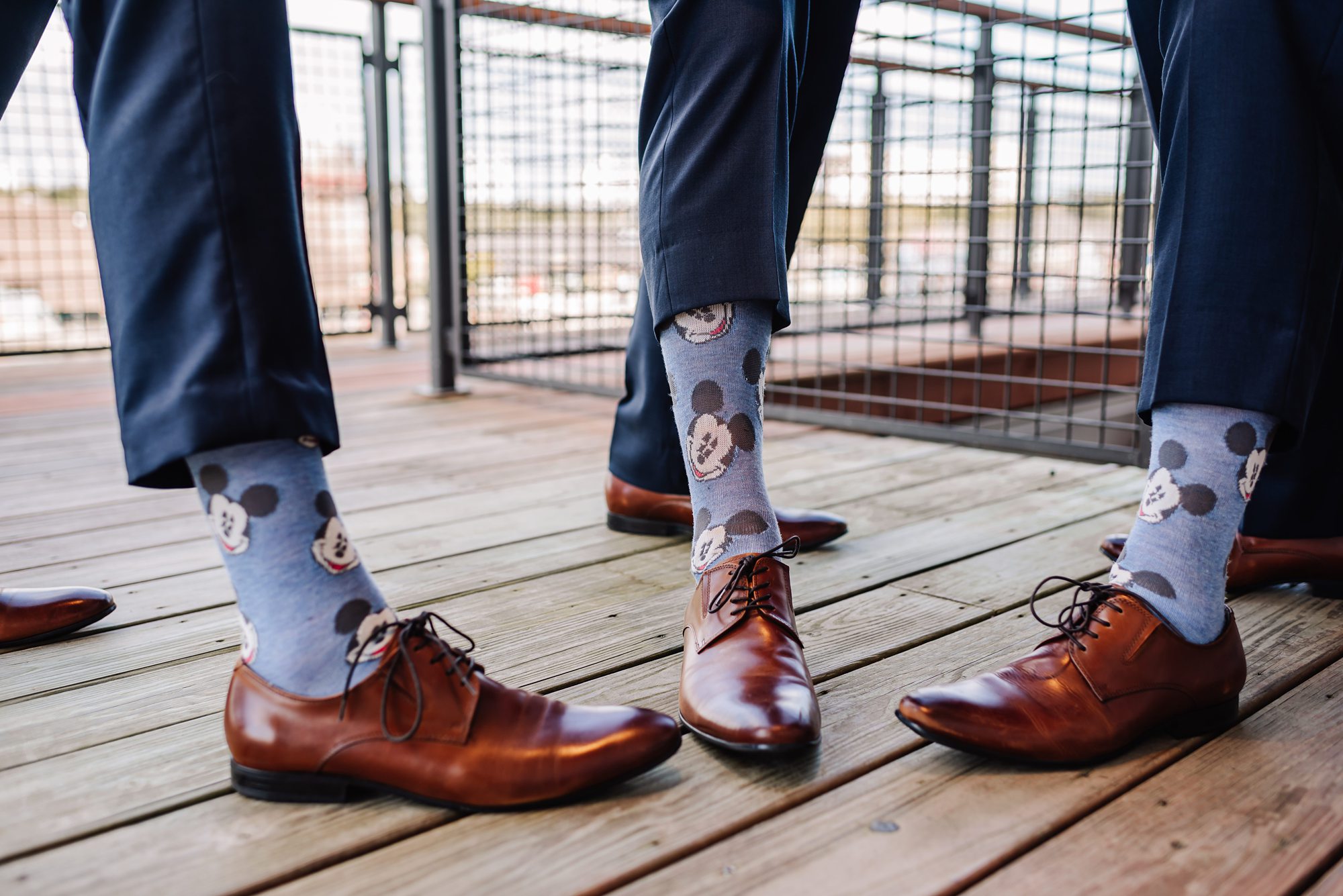 groomsmen with matching Mickey Mouse socks