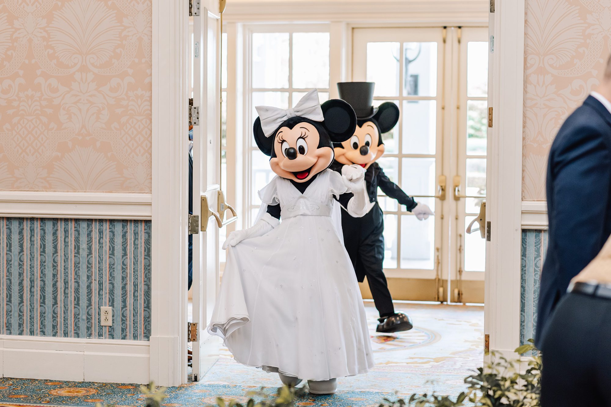 Minnie and Mickey Mouse at disney grand Floridian wedding
