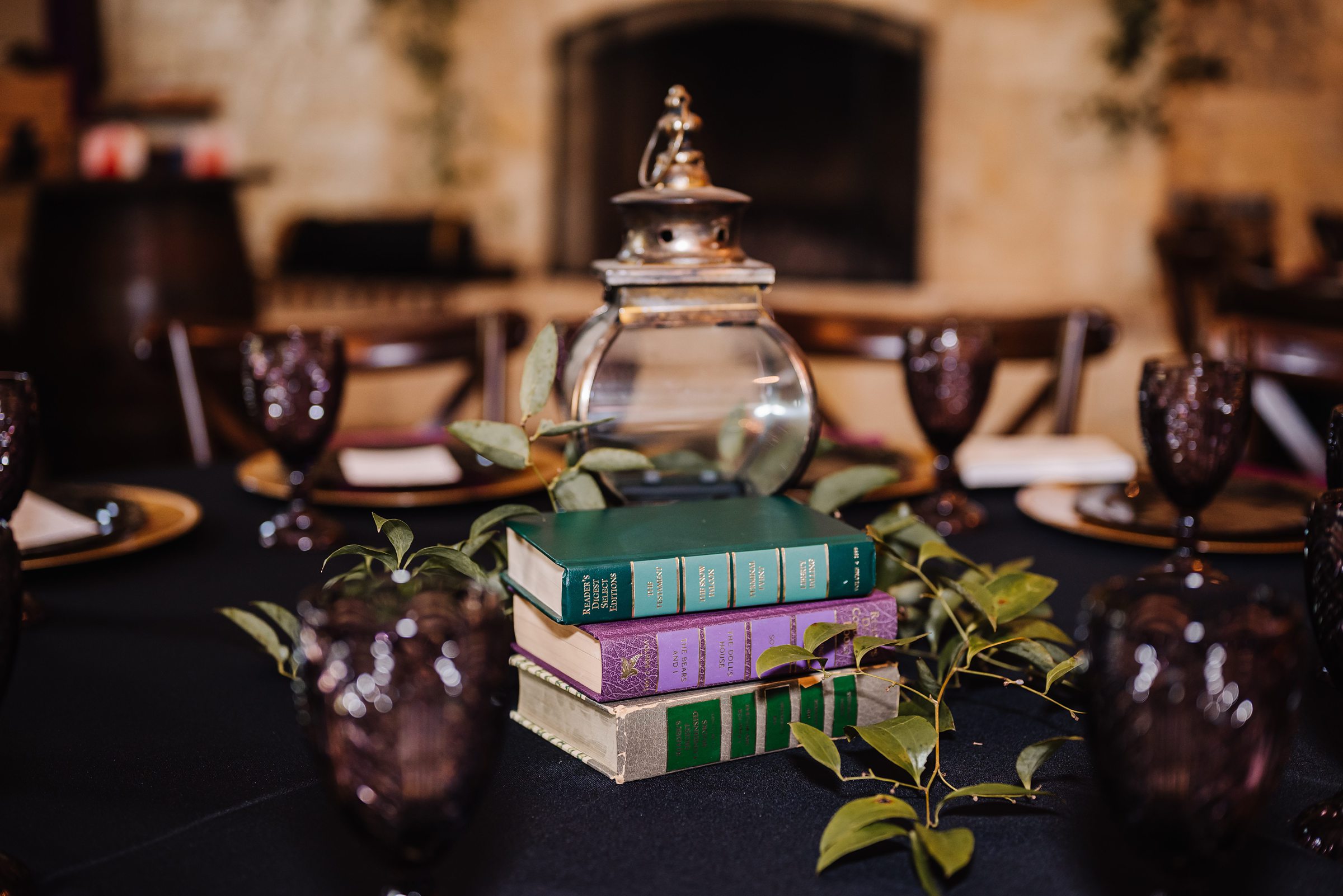 wedding reception book and lantern table center pieces