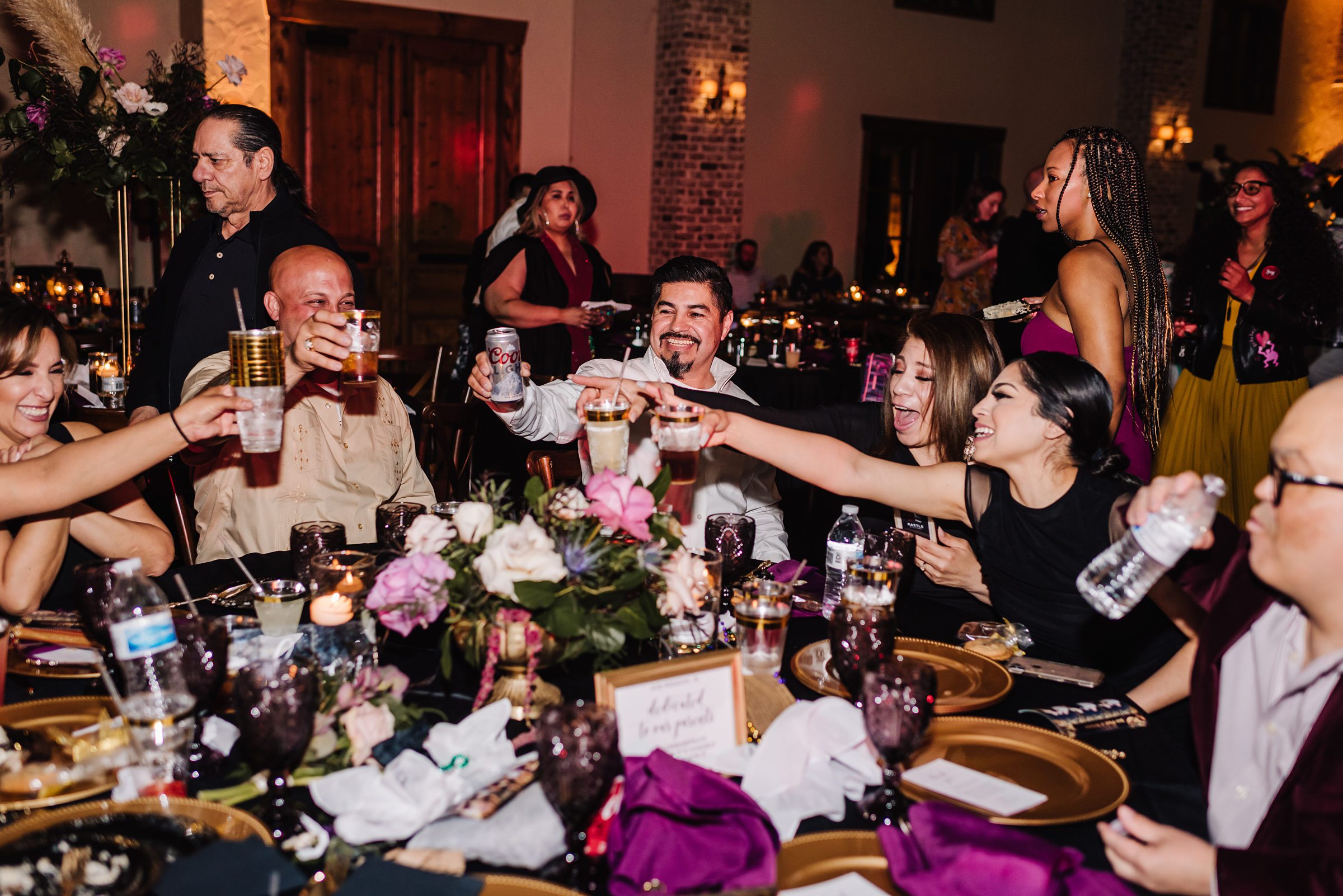 guests toasting at wedding reception