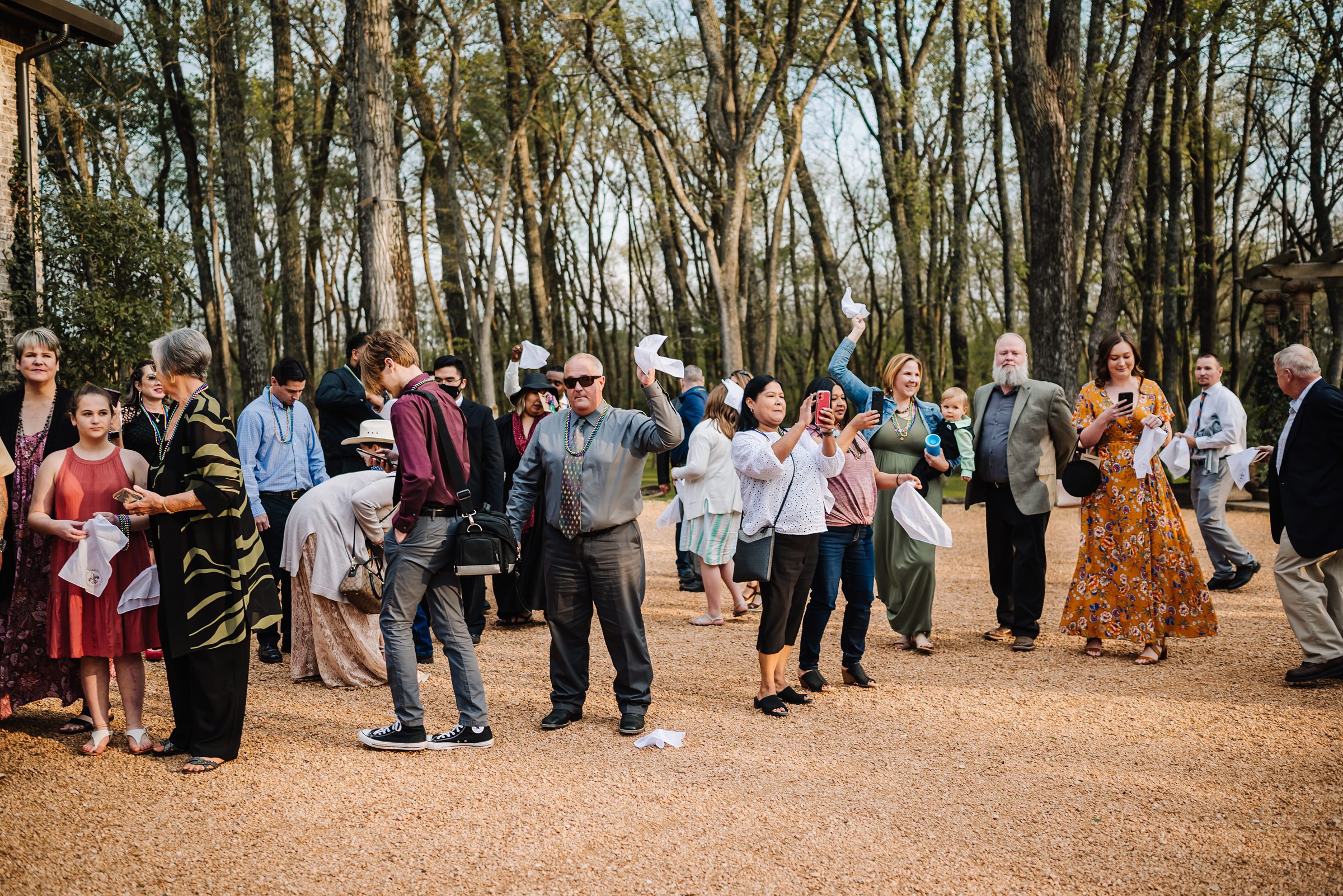 guests participating in second line at Nola themed wedding