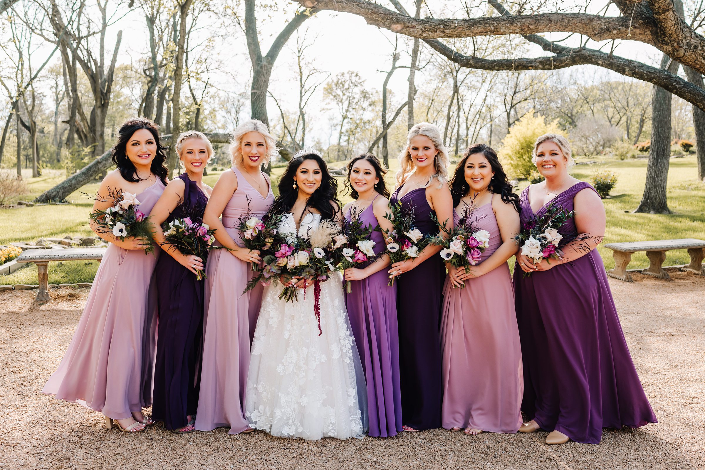 bridesmaids with purple colored dresses