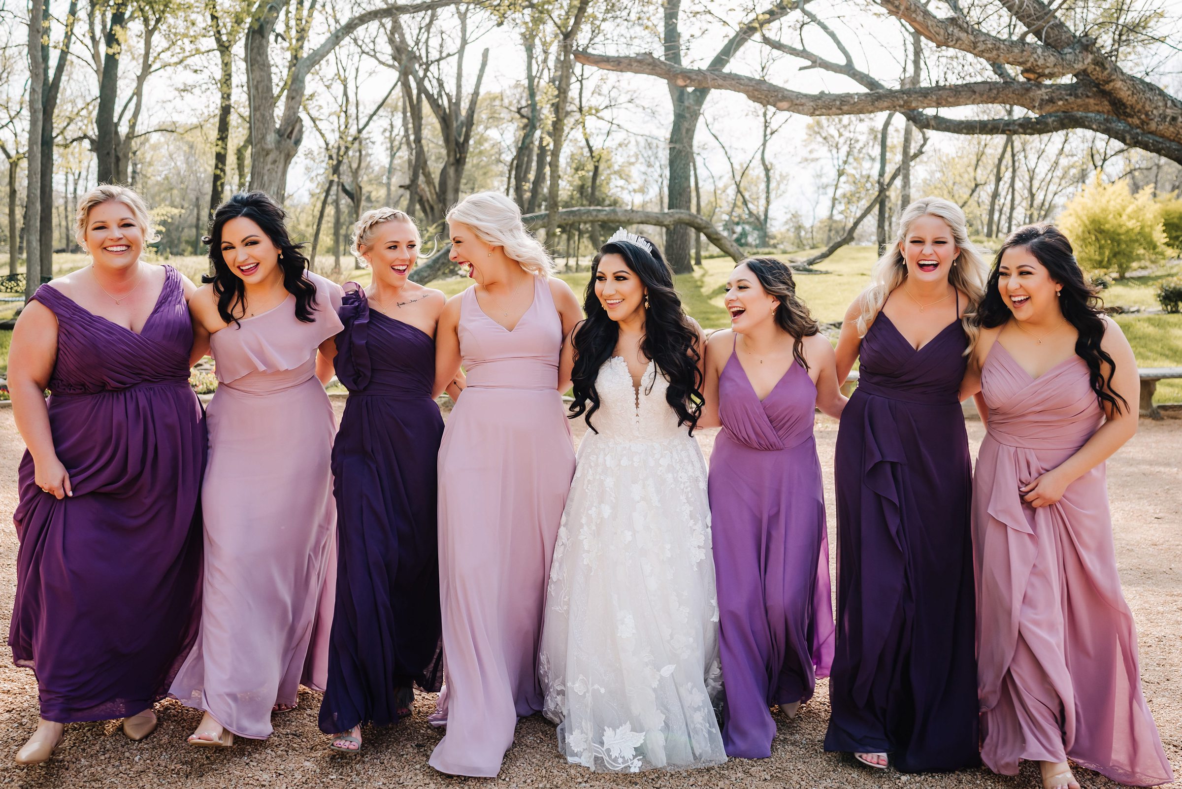 bridesmaids with purple colored dresses