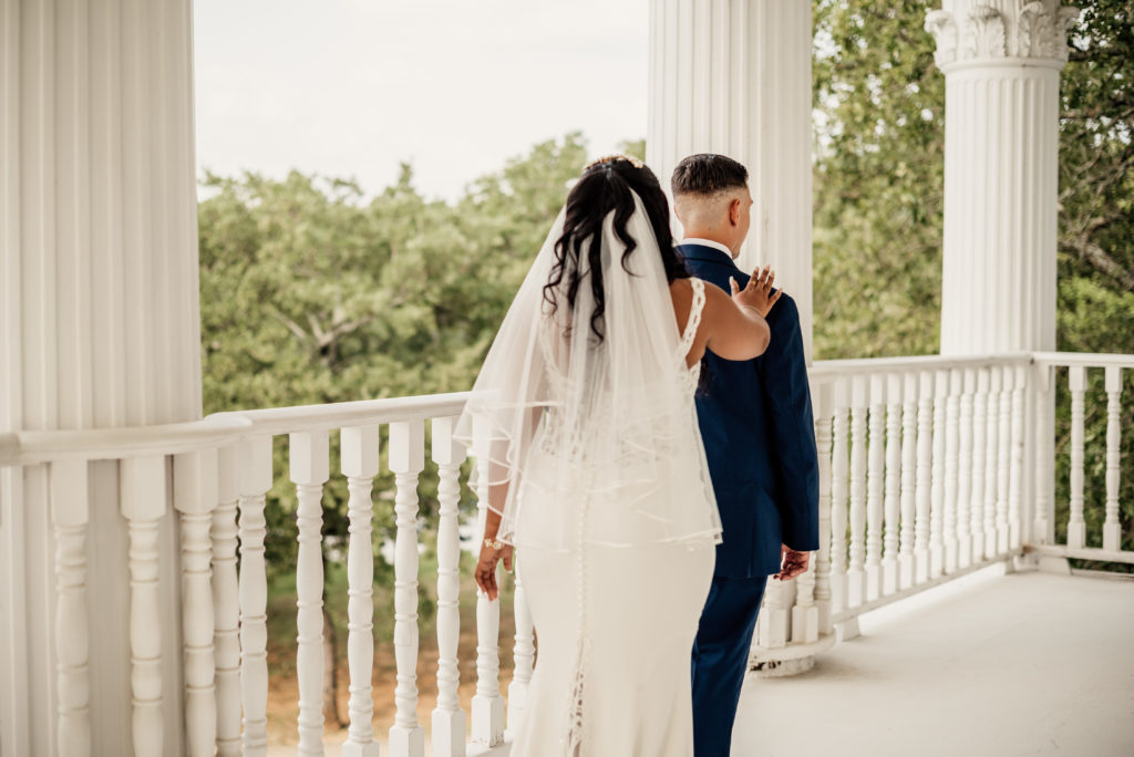 first look between bride and groom at lodestar mansion in Fort Worth texas