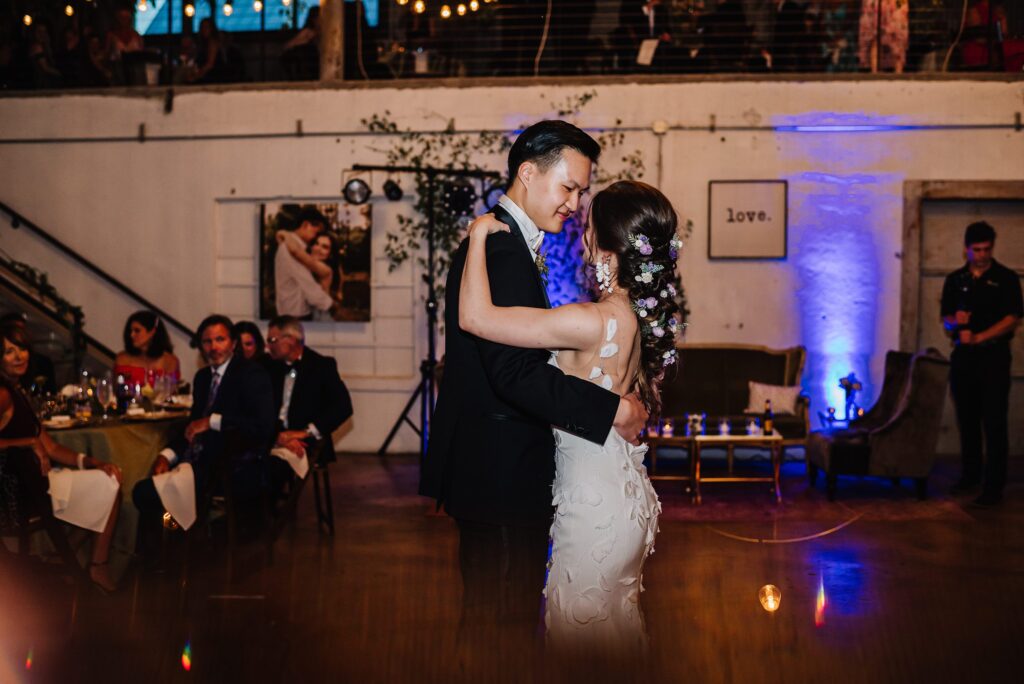 bride and groom sharing first dance at the 4 eleven