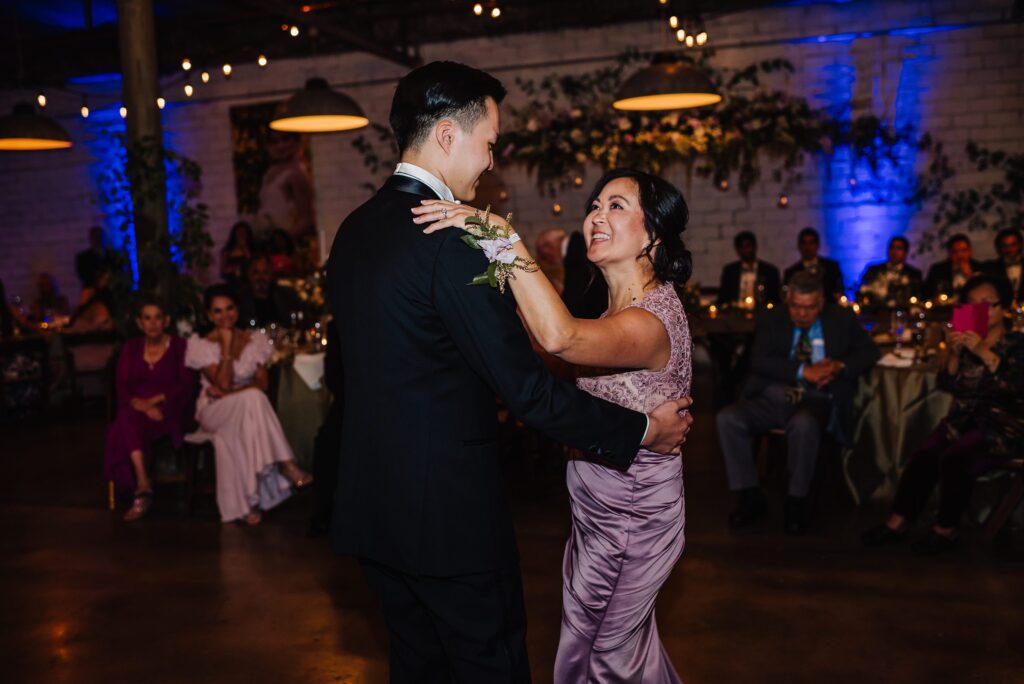 groom and mother dance at the 4 eleven